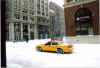 yellow cab in snow.jpg (68099 bytes)